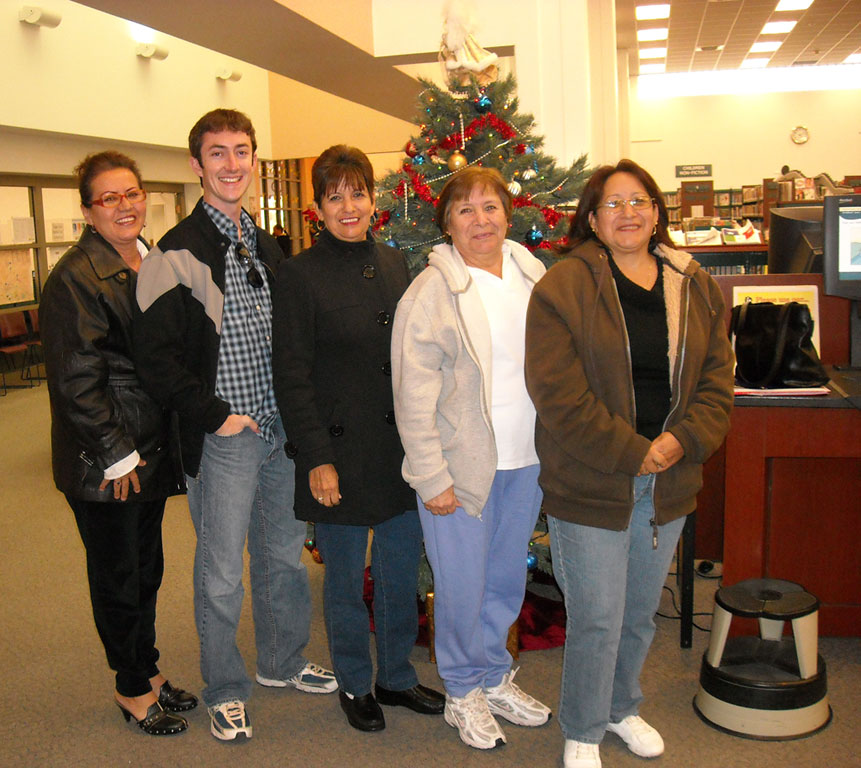 Chris Jolley, 23, and four of his students at the Ysleta Public Library citizenship classes, fall 2009. (Courtesy of Chris Jolley)