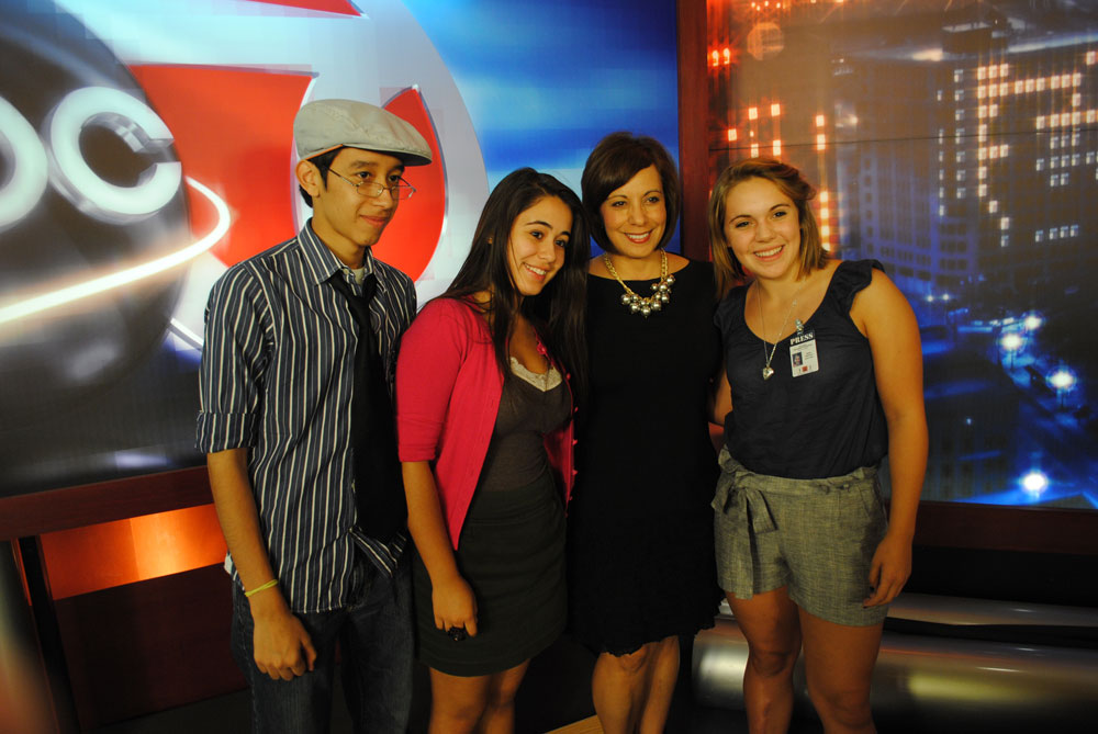 Journalism in July participants, Andy Martinez, Stephanie Avalos and Sarah Skirmont surround KVIA anchor, Estela Casas. (Omar Perez/Borderzine.com)