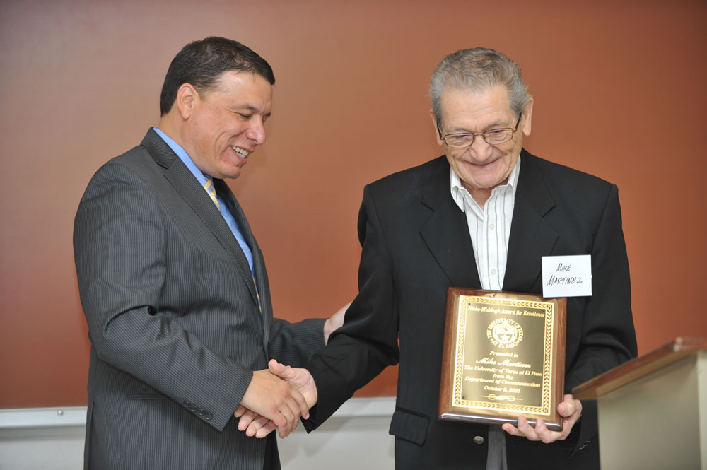 Mike Martinez receives the 2010 Hicks-Middagh Award for Outstanding Alumni in the field of Communication from Dr. Frank Pérez. (Brian Kanof/Courtesy of the UTEP Dept. of Communication)