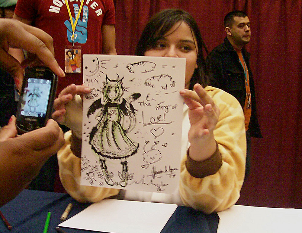 Danielle A. Aguirre shows off her second place winning drawing during Las Cruces Anime Days 2011's Iron Artist competition. (Photo courtesy of Alicia Nicole Bracken)