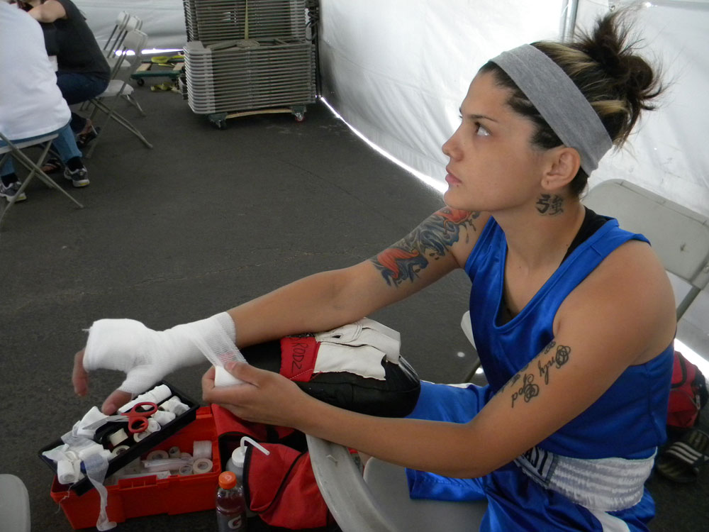 Rodriguez prepares before her fight. (Georgia Rodriguez/Borderzine.com)
