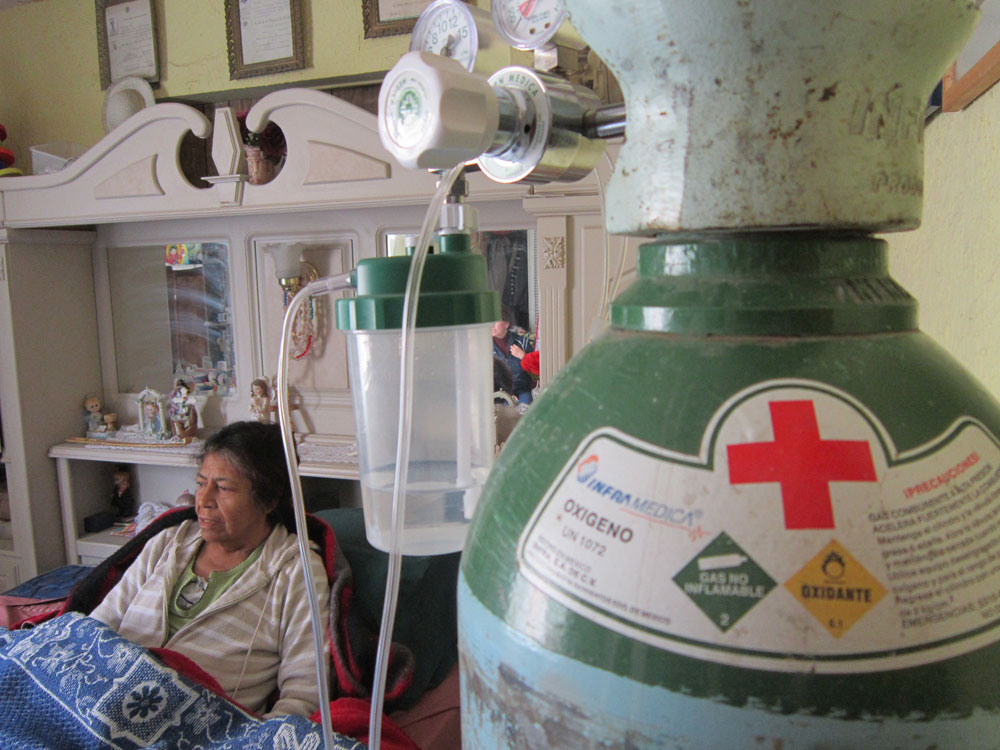 Guadalupe Vargas, 62, a diabetes patient, lives her life in bed. (Idalí Cruz/Borderzine.com)