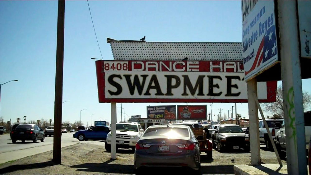 The Dance Hall/Swap meet sign sits in the front parking lot of the property. (Amanda Duran/Borderzine.com)