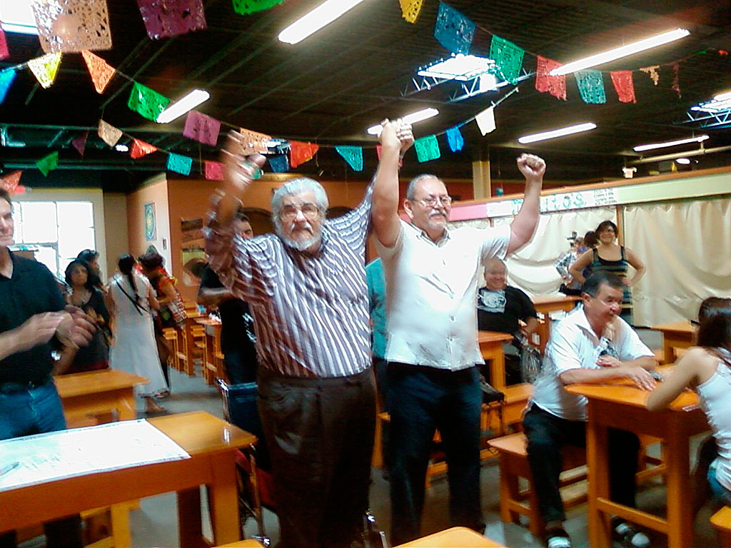 Reies Lopez Tijerina and José Ángel Gutiérrez at Mercado Mayapán celebrate 40 years of La Raza Unida. (Courtesy of Dennis Bixler- Marquez)