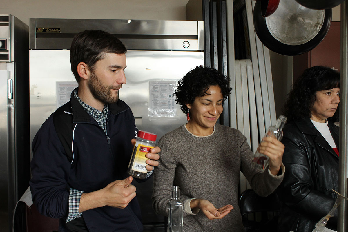 Mark Eshelman and Cristina Dominguez use chiles for infused cooking oil. (April Lopez/Borderzine.com)