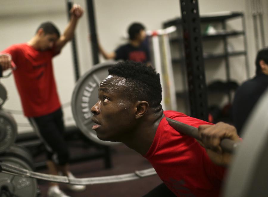 High school senior Moise Damey, working out for his track team, is “in limbo” awaiting his mother’s next hearing in her bid for asylum. (David Joles/Star Tribune)