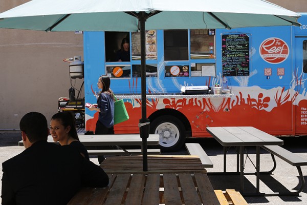 Customers wait for their lunch orders at the Foodville Truck Park in downtown El Paso. (Laura Camden/Borderzine.com)