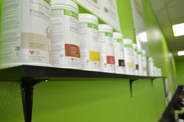 Herbalife products line the walls of a Trujillo's Socorro shop