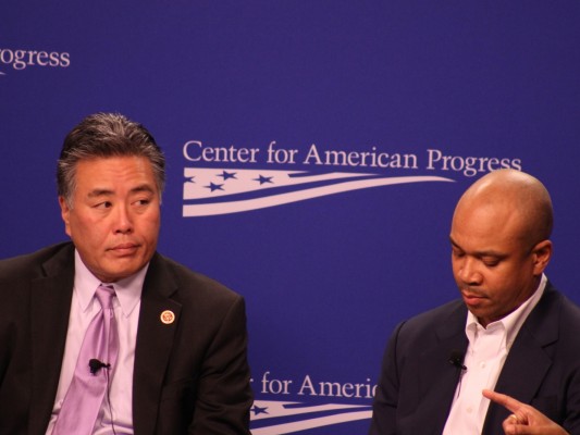 Rep. Mark Takano, D-Calif., joins Pastor Delman Coates on Wednesday at the launch of the Center for American Progress’ report about LGBT discrimination. Takano and others called for new federal legislation with comprehensive protections for LGBT people. SHFWire photo by Wesley Juhl