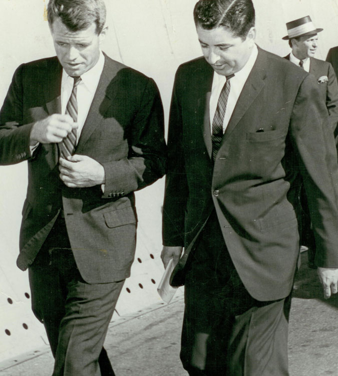 Salazar with Robert F. Kennedy. At right rear is singer Frank Sinatra.