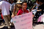 "It's enough. No more innocents dead." (Dolores Dorado/Borderzine.com)