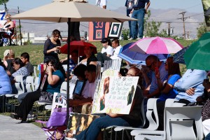 Hundreds of friends and family of victims of violent crime gather in Yucca Park at the annual reading of more than 1,500 names engraved into the memorials granite walls.(Danya P. Hernandez / Borderzine)
