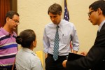 Maria Espinoza talks to Congressman Beto O'Rourke (D-Texas) about her concerns about U.S. military intervention in Syria after the town hall meeting on Sept. 2 at the Mills building in Downtown El Paso. (Aaron Montes/Borderzine)