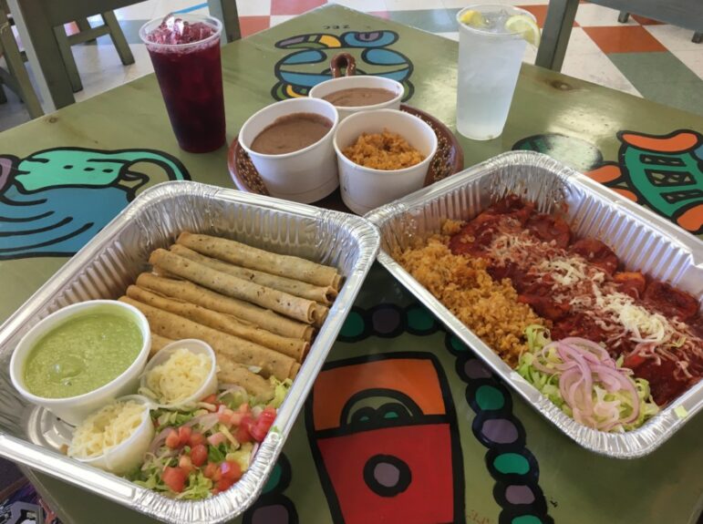 Trays of enchiladas and flautas