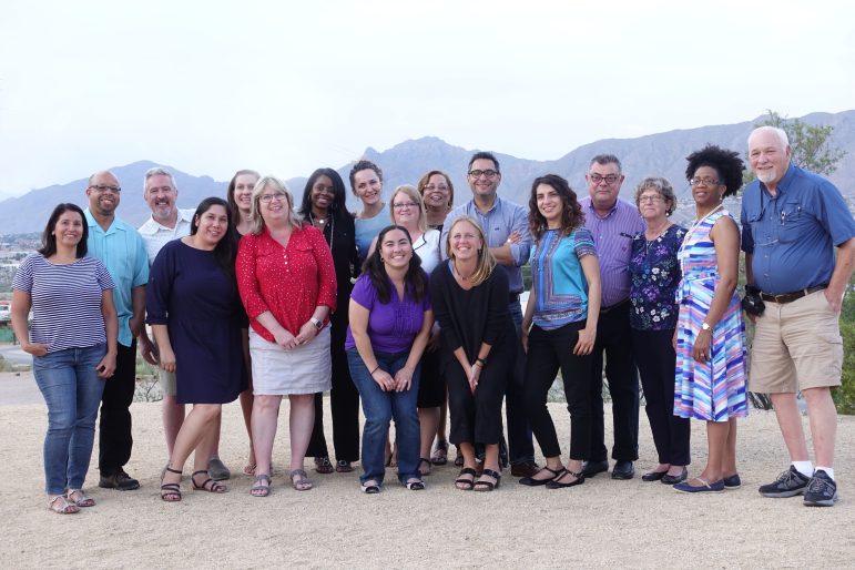 Dow Jones News Fund Multimedia Training Academy Class of 2017 with trainers and the Franklin Mountains in the background.