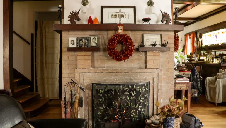 View of the fireplace in a 118-year-old house on Montana Avenue, where pictures of family dating back almost 100 years.