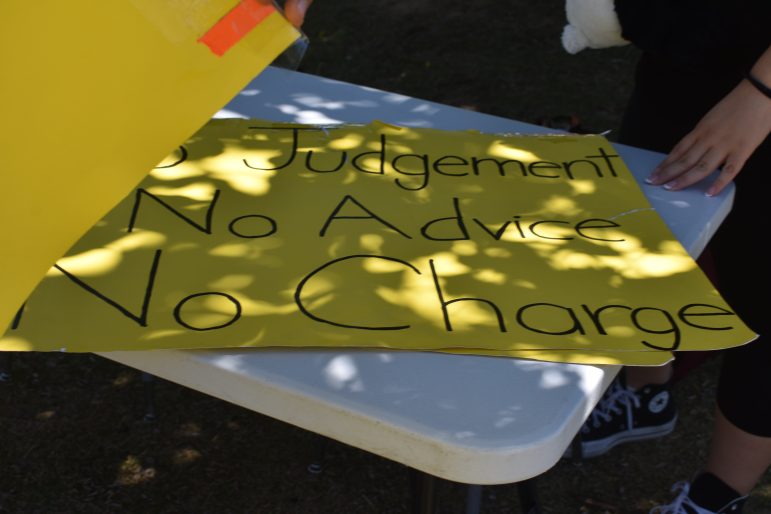 Burges staff helped Ortega lending him the table and chairs and providing materials for his signs.