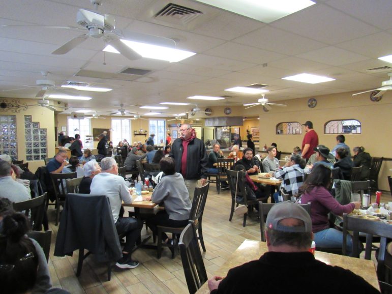 The main dining room of the Lunch Box has every table filled